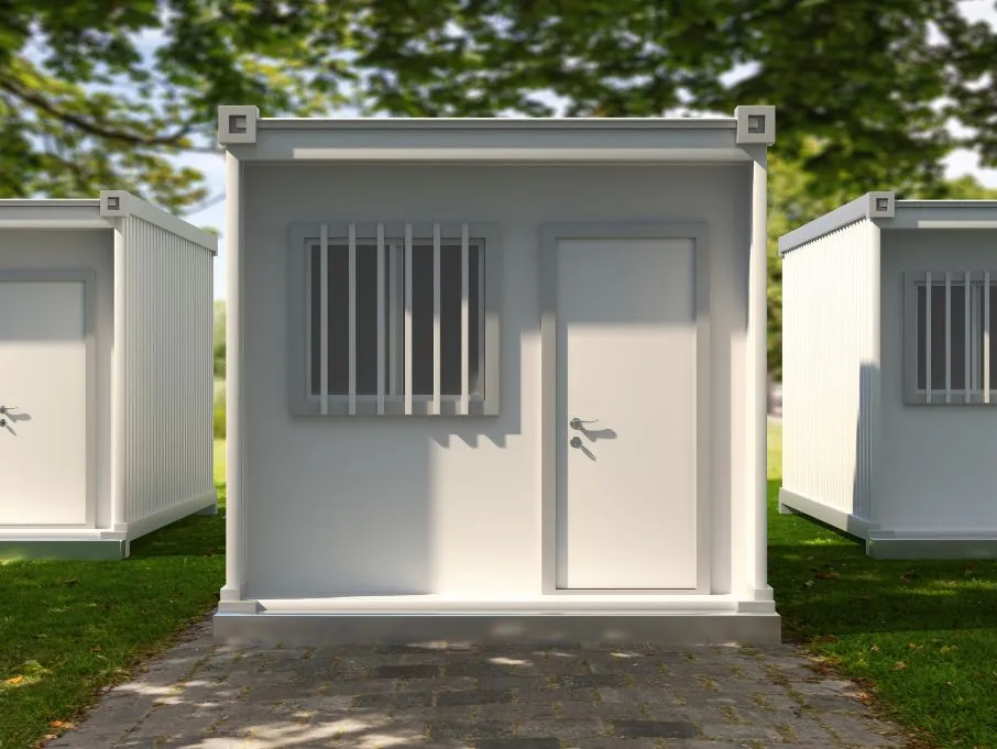 Three white porta cabins featuring windows and doors, showcasing a modern prefabricated building