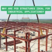 Industrial pre-engineered building (PEB) facility showing a large clear-span steel frame manufacturing plant with high ceilings, natural lighting, and unobstructed production floor space for heavy machinery installation.